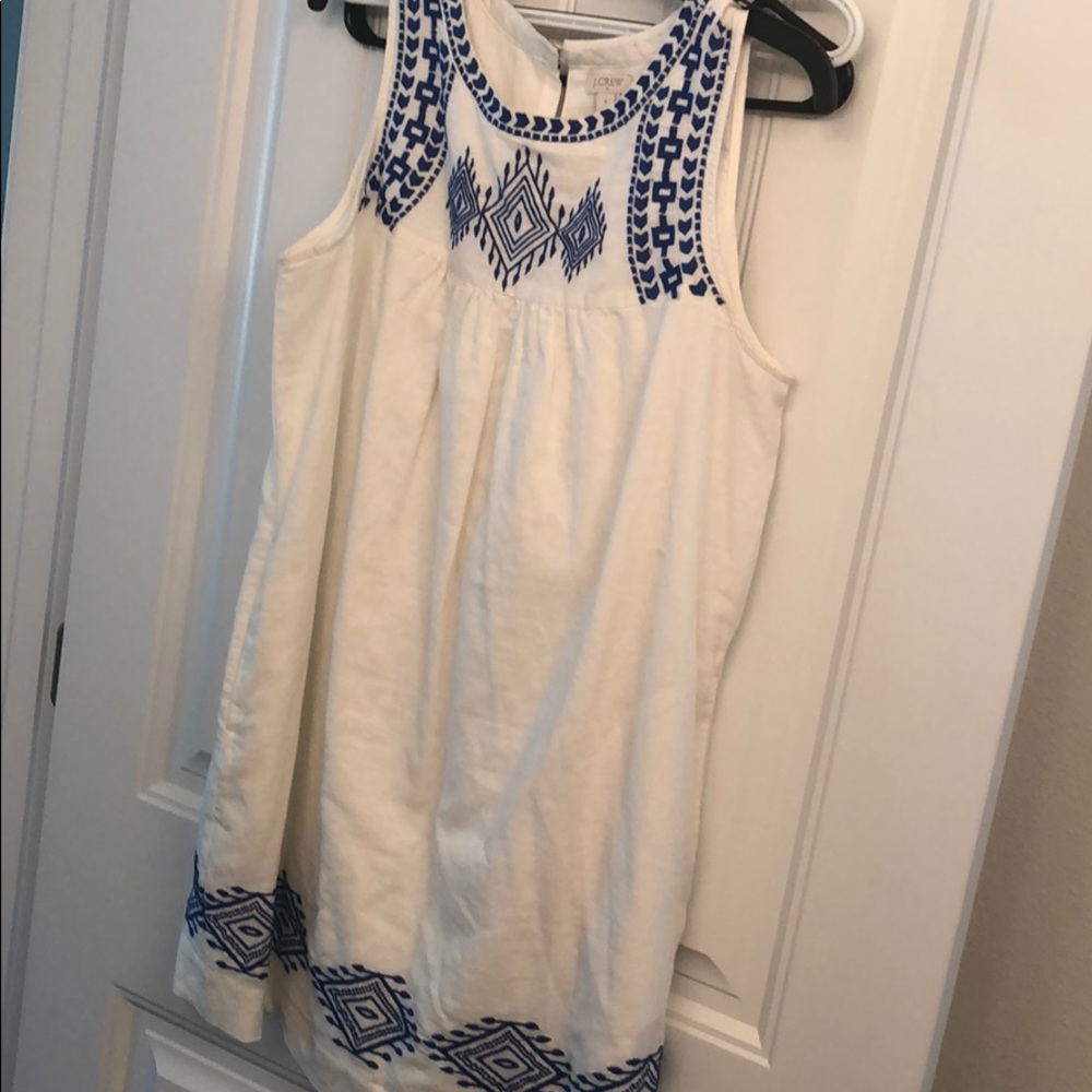 Embroidered scoop neck dress.